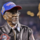 This photo from Sunday, April 15, 2012, shows Tuskeegee Airman Wilfred Defour, left, with Jackie Robinson’s widow Rachel Robinson, right, on Jackie Robinson Day at a New York Yankees’ baseball game in New York. Police say a health aide found DeFour, 100, unconscious and unresponsive inside his Harlem apartment Saturday morning.